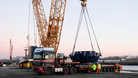 Ian Forsyth/Getty Images Cutter head loaded on to lorry
