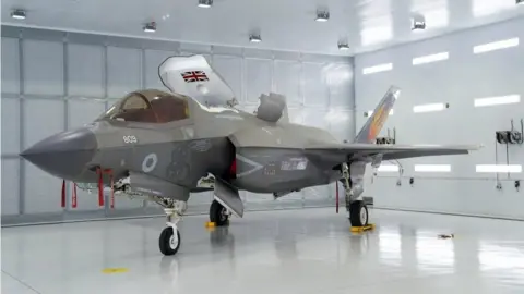 PA Media An F-35 Lightning stealth jet from 809 Naval Air Squadron during the commissioning ceremony at RAF Marham