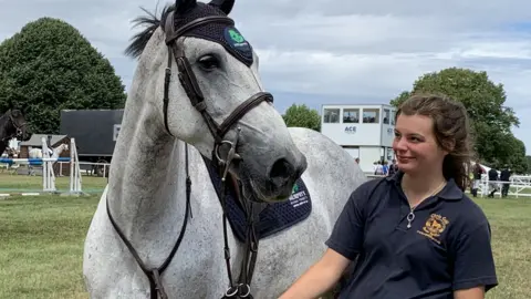 Stephanie Nelson/BBC Horse and rider at the Royal Norfolk Show