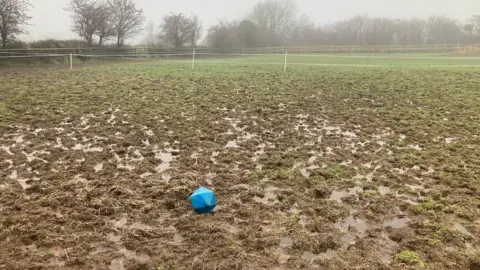 A muddy field