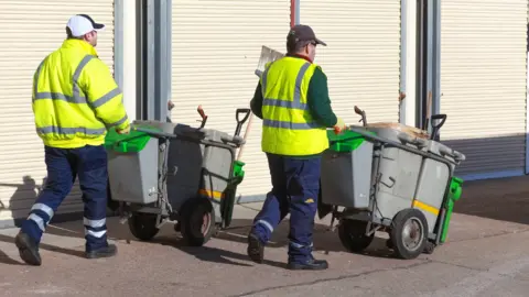 Getty Images Street cleaners