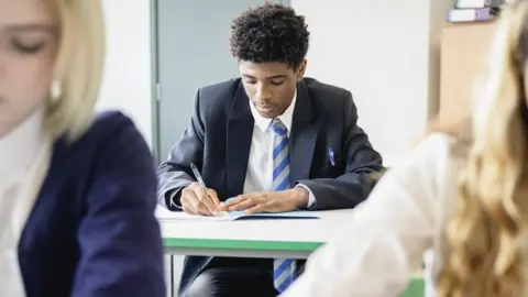 Boy sitting exam