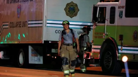 Reuters Rescuers in Surfside