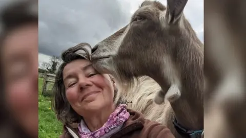 Sue Sabin Sabin and goat