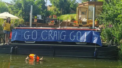 Rob Stringer A banner saying Go Craig Go