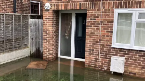 Salimata Whyte's flooded house