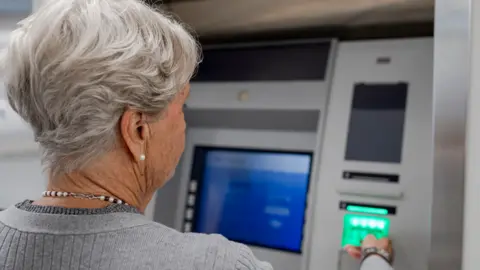 Woman at ATM