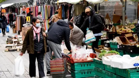 Shoppers at stalls