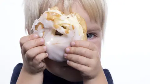 Getty Images Small boy with cake