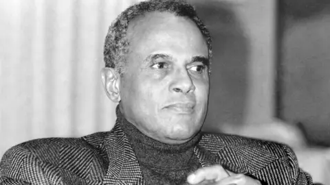 PA Media File photo dated 30/11/88 of American actor and singer, Harry Belafonte, on a visit to Helsinki