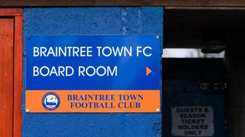 Picture of a sign pointing to Braintree Town FC's boardroom