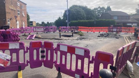 Barriers surrounding a sinkhole