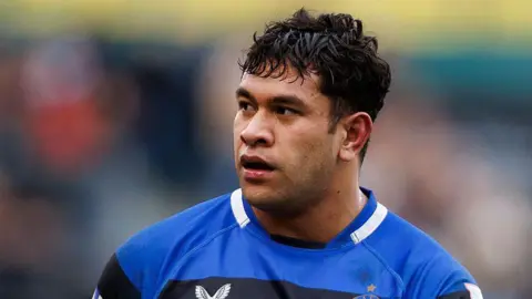 Kepueli Tuipulotu standing on the pitch during a match for Bath