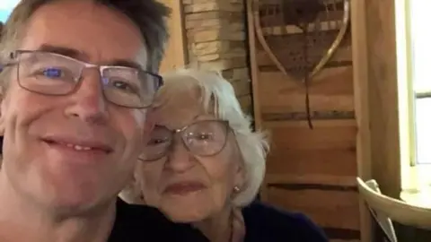 Jeremy Lane A selfie of Jeremy Lane and his mother, Miriam taken inside a restaurant. 