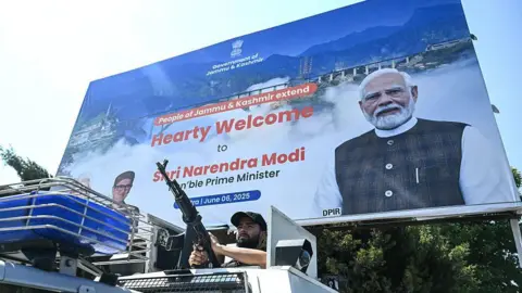 Getty Images An Indian security personnel keeps watch outside the Srinagar railway station ahead of the inauguration of the Kashmir rail link by the Indian Prime Minister Narendra Modi, in Srinagar on June 6, 2025.