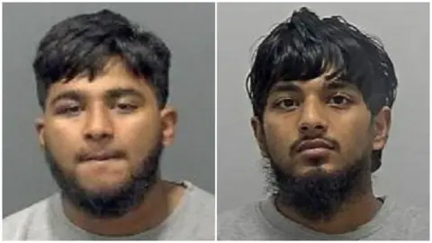 Bedfordshire Police Close-up images of two men, Athif and Althaf Hussaindeen, who are wearing grey T-shirts. They both have black hair and black beards. 