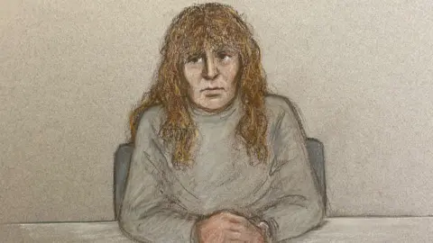 An artist's impression by Julia Quentzler shows Nancy Pexton is a grey polo neck long sleeved top sitting at a table with a grey background behind her.