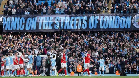 The message sent by Manchester City's fans to Arsenal after their vital victory at Etihad Stadium