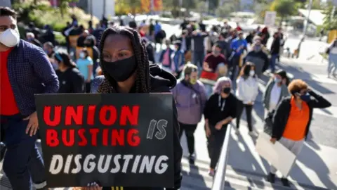 Reuters People protest in support of the unionizing efforts of the Alabama Amazon workers, in Los Angeles, California, U.S., March 22, 2021.