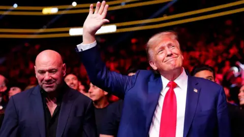 Getty Images Donald Trump and Dana White attend UFC 296