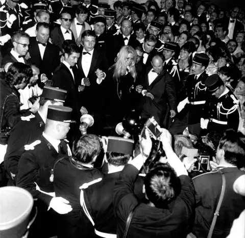 Gamma-Rapho via Getty Images Actress Brigitte Bardot and her husband Gunter Sachs at the 1967 Cannes Film Festival, Cannes, France