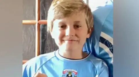 Family Handout Keaton Slater wearing a Sky Blues shirt 