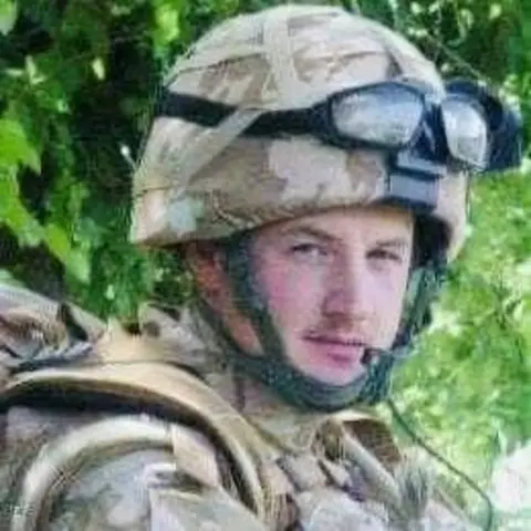 Binnie family Soldier Sean Binnie, who served with the Black Watch, in camouflage uniform, looking at camera.
