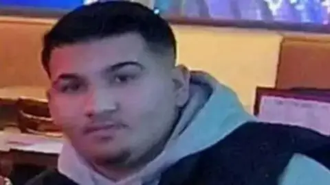 Kevin Potuka, 19, who died after being shot on Page Hall Road in Sheffield in December 2023. Man with black hair, grey hoody, black gilet.