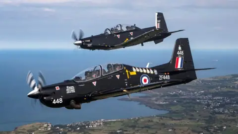 Crown Copyright Two RAF Texan T1 aircraft over Anglesey