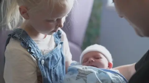 Avery, 4, meet her brother Carter for the first time