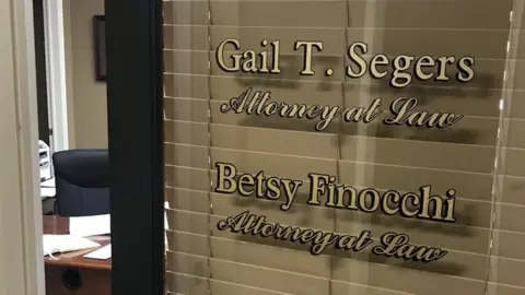 Betsy Finocchi attorney office door