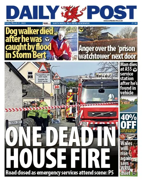 Daily Post Daily Post front page with a picture of fire service personnel at a scene, with the headline "One dead in house fire." In the top left is a headline that reads "Dog walker died after he was caught by flood in Stom Bert"