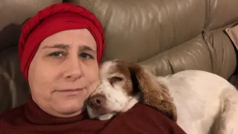 Family handout Laura with a dog