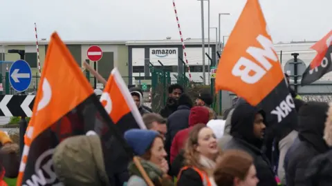 PA Media GMB union members striking at Amazon's depot in Coventry