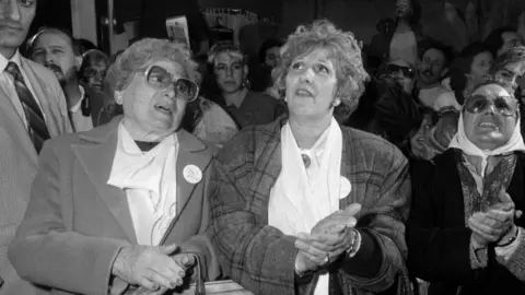 Getty Images black and white image of Rosa Rozyneplit and Acela de Carloto in a rally