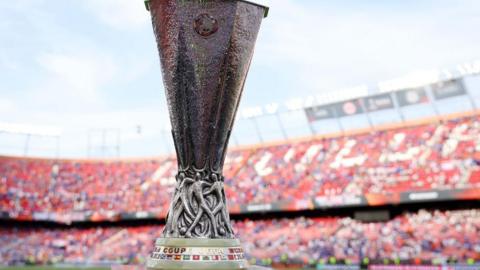 The Europa League trophy stands on display