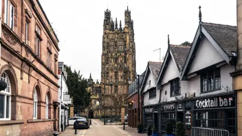 Paul Stafford St Giles Church and shops in Wrexham