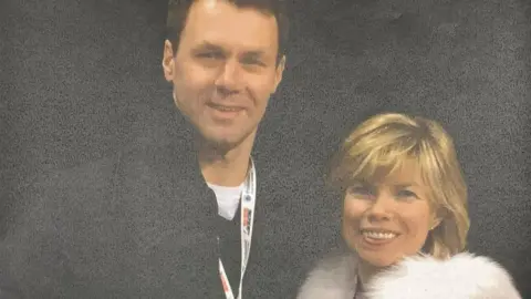 Supplied image Vadim Naumov, a man wearing a black jacket and white t-shirt, and Evgenia Shishkova, a woman with short blonde hair wearing a furry white jacket.