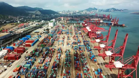 Getty Images Containers are seen at a port in China