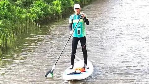 Gary Dyer on a paddleboard