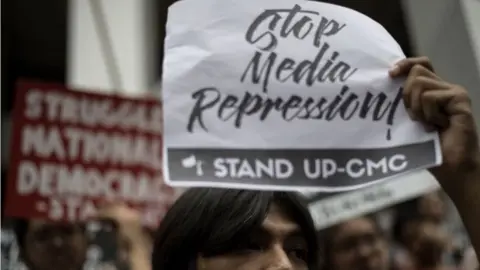 Getty Images Students of the University of the Philippines participate in a protest to defend press freedom in Manila