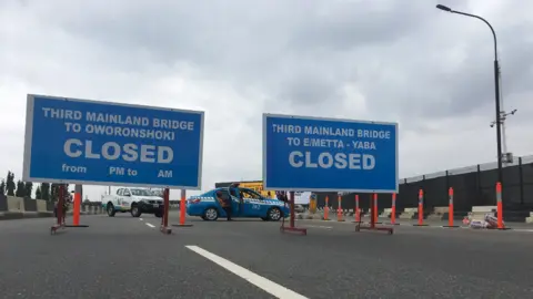 BBC/Ayo Bello Closed signs on the Third Mainland Bridge in Lagos, Nigeria