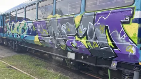 The Midland Railway Butterley Graffiti on a train