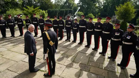 PA Media King Charles meets soldiers who carried out a gun salute at Hillsborough Castle