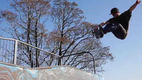 Richard Youle Skater Ian Thomas on the Mumbles skate park