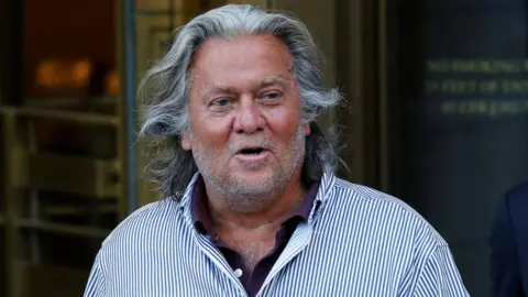 Reuters Steve Bannon, dressed in a pinstripe shirt