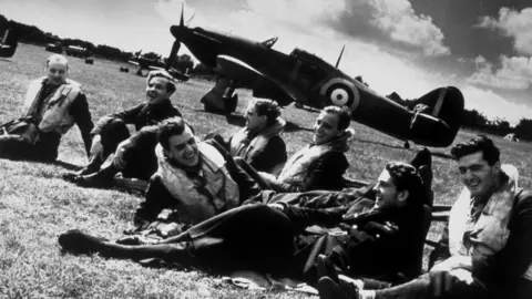 Battle of Britain Museum That family of Rupert Smythe (far left) are being sought for the unveiling