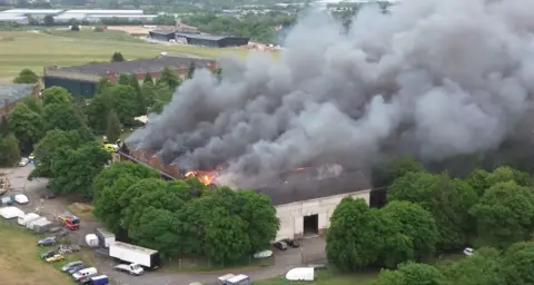 Bicester Heritage from the air on fire