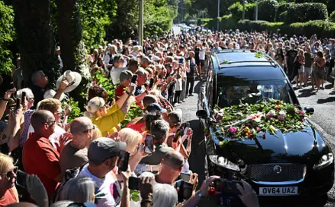 Flowers on a hearse