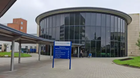 LDRS Image shows the glass-fronted entrance to Blackpool Victoria Hospital. 